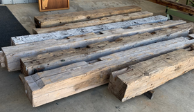 hand hewn reclaimed beam fireplace mantels
