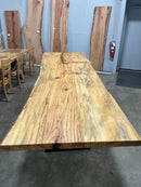 Finished live edge blue pine slab with natural grain and blue-gray streaks
