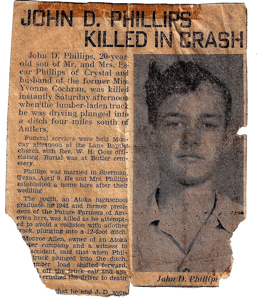 Vintage newspaper clipping with a portrait of John D. Phillips and news of his death in a crash.