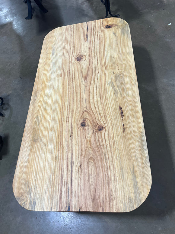 Finished square edge blue pine slab with natural grain and blue-gray streaks
