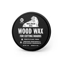 A round container labeled 'Walrus Oil Wood Wax for Cutting Boards', with additional information stating it is made with plant-based ingredients, non-GMO, and vegan.