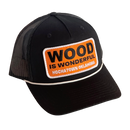 A black hat with a Wood is Wonderful Hochatown Oklahoma patch