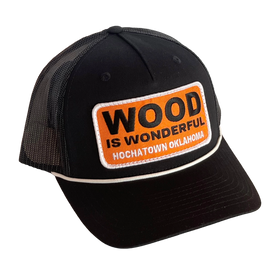 A black hat with a Wood is Wonderful Hochatown Oklahoma patch
