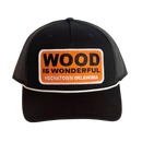 A black hat with a Wood is Wonderful Hochatown Oklahoma patch
