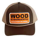 A brown and tan hat with a Wood is Wonderful Hochatown Oklahoma patch