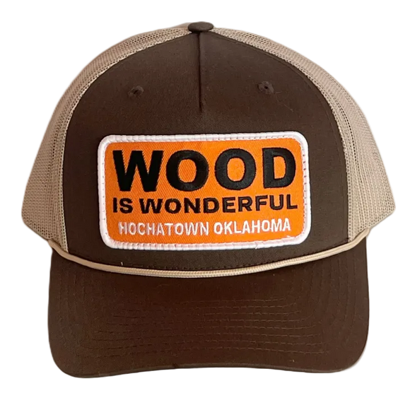A brown and tan hat with a Wood is Wonderful Hochatown Oklahoma patch