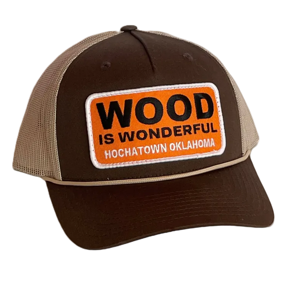 A brown and tan hat with a Wood is Wonderful Hochatown Oklahoma patch