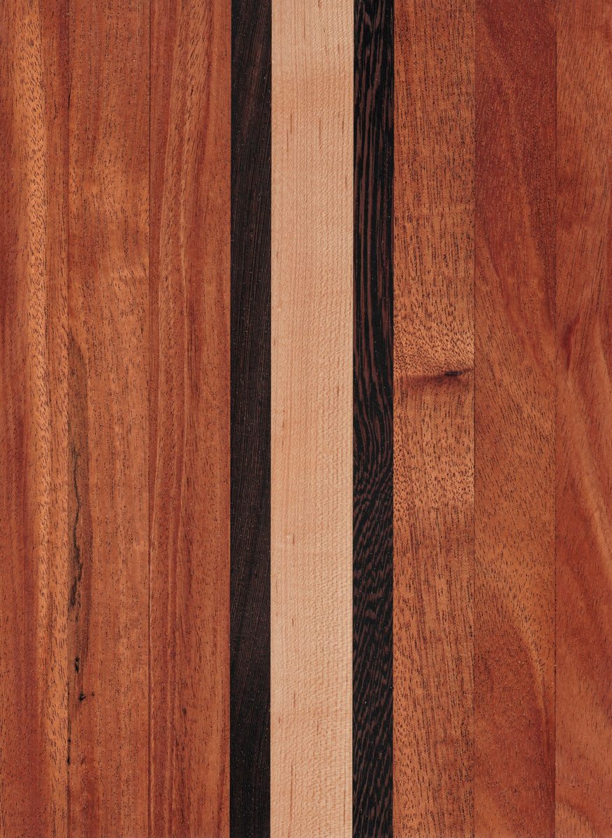 A wooden cutting board with a pattern of natural wood stripes.