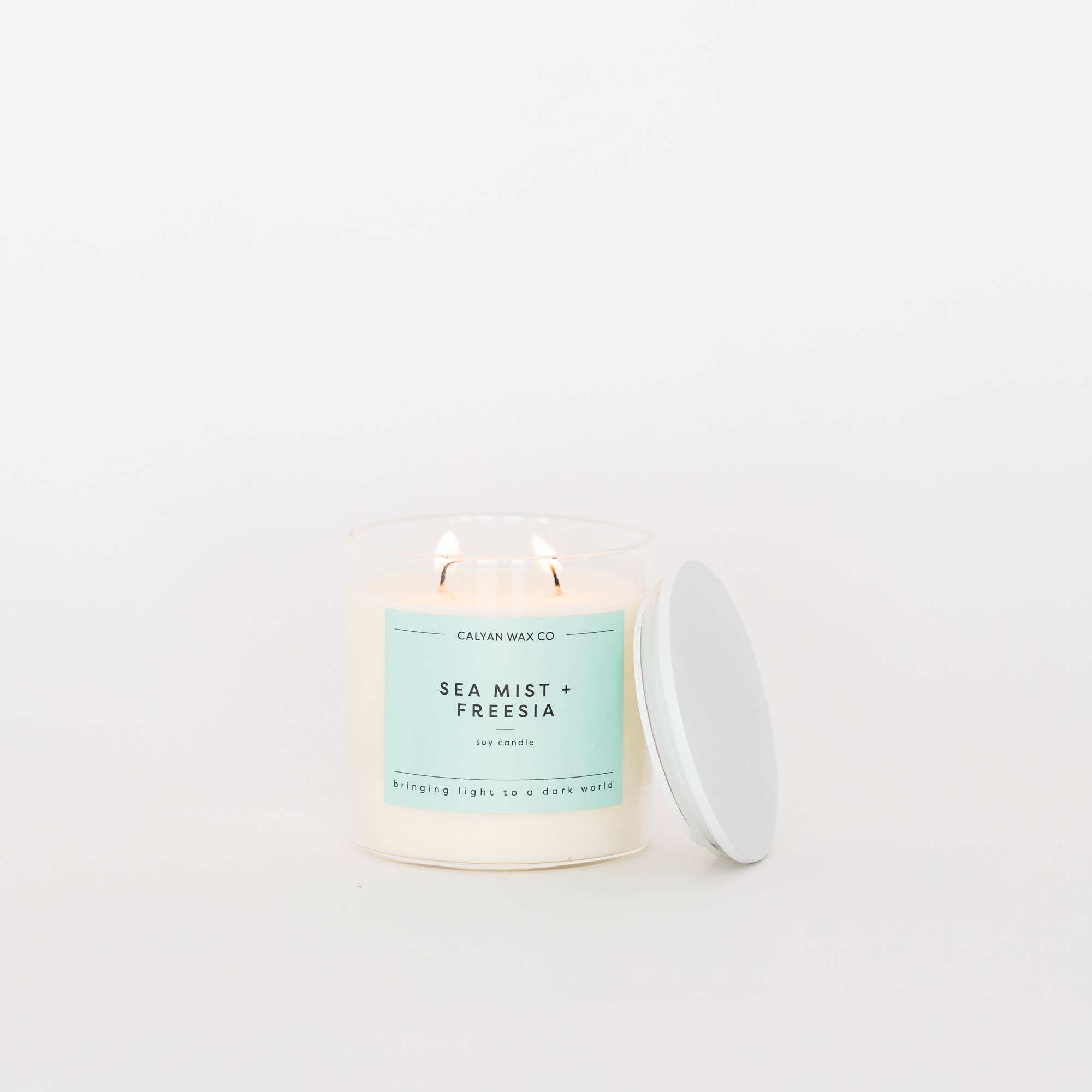 Calyan Wax Co. - Sea Mist + Freesia - Clear Glass Tumbler Soy Candle
