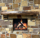 A live edge style fireplace mantel, made from walnut wood, mounted to a rock wall.