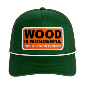 A kelly green hat with a Wood is Wonderful Phillips Forest Products patch