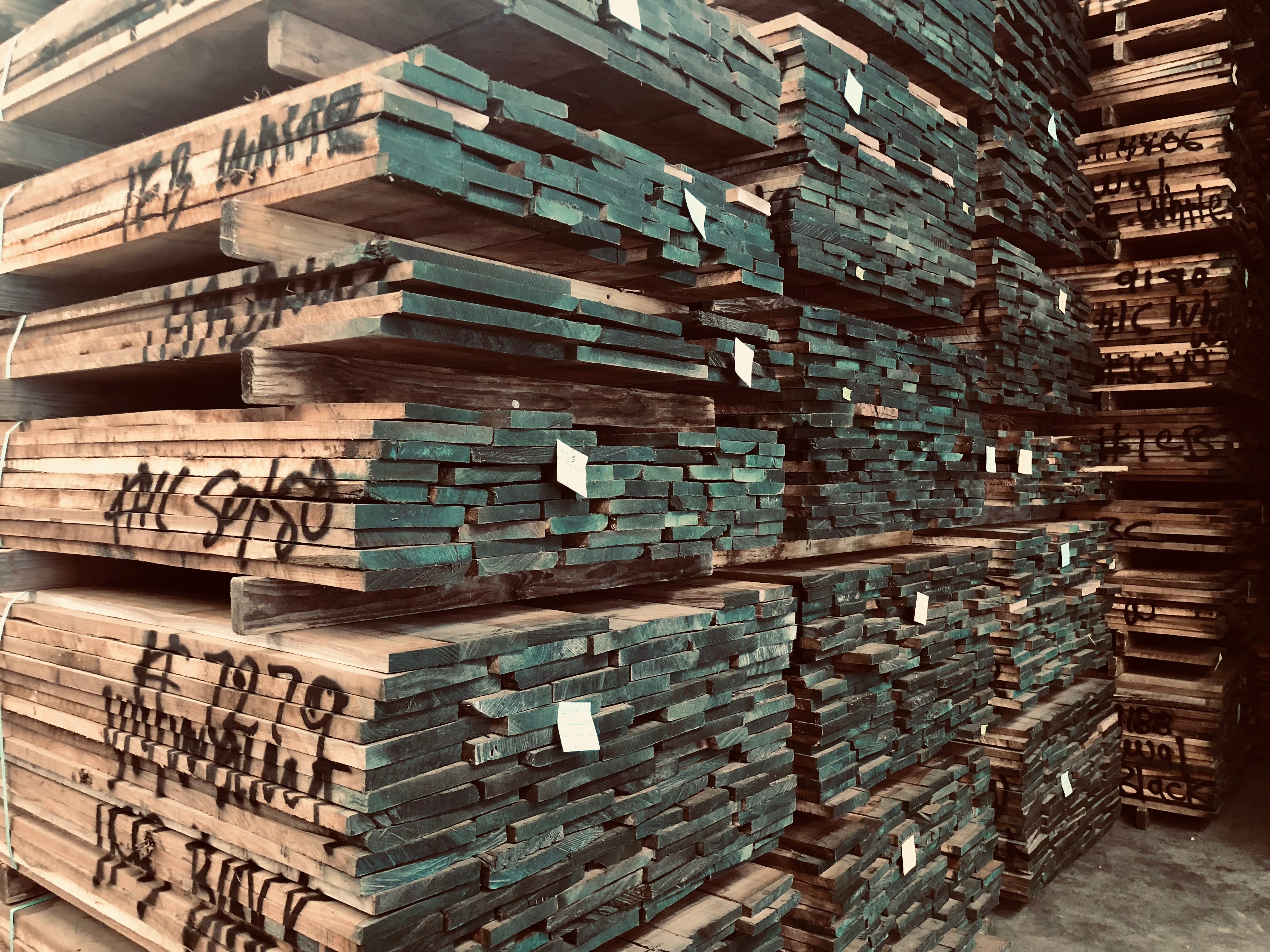 bundles of kiln dried oak lumber for milling and furniture. 