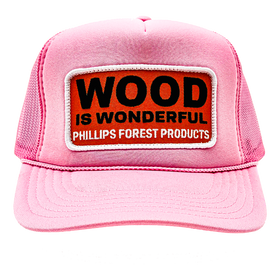A light pink trucker hat with a Wood is Wonderful Phillips Forest Products patch