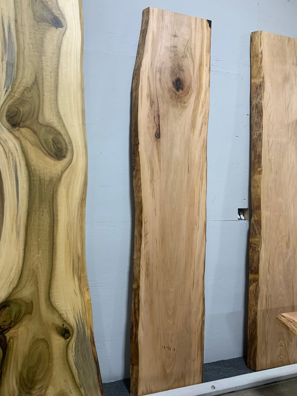  Live edge sycamore wood slab with natural grain and satin finish
