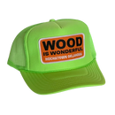 A neon green trucker hat with a Wood is Wonderful Hochatown Oklahoma patch