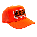 A neon orange trucker hat with a Wood is Wonderful Phillips Forest Products patch