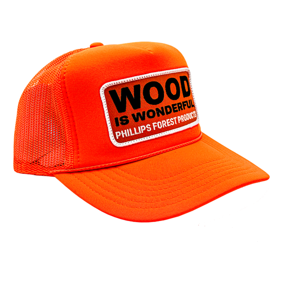 A neon orange trucker hat with a Wood is Wonderful Phillips Forest Products patch