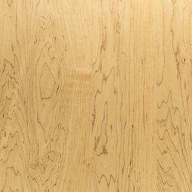 Close-up view of a piece of northern hard maple lumber displaying its wood grain. 