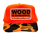 An orange camo trucker hat with a Wood is Wonderful Phillips Forest Products patch