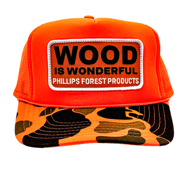 An orange camo trucker hat with a Wood is Wonderful Phillips Forest Products patch