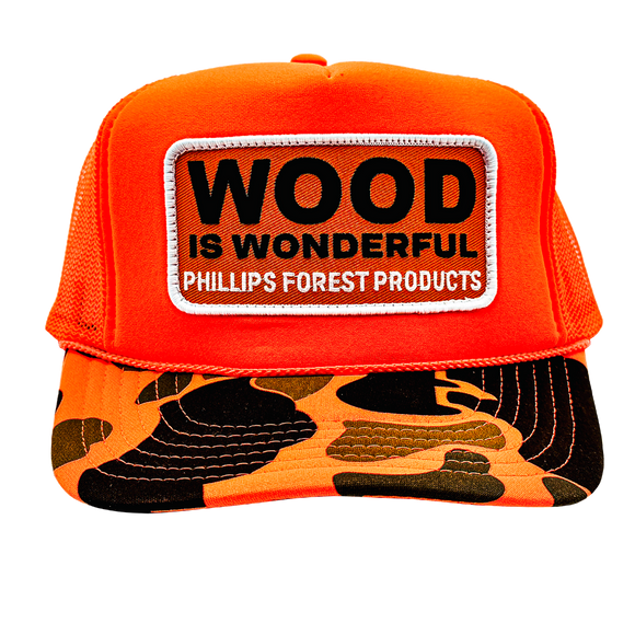 An orange camo trucker hat with a Wood is Wonderful Phillips Forest Products patch