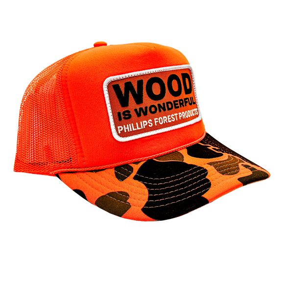 An orange camo trucker hat with a Wood is Wonderful Phillips Forest Products patch