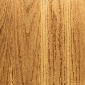Close-up view of a piece of red oak lumber displaying its wood grain.