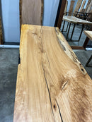 Square edge pecan slab with rich golden-brown tones, natural grain patterns, and organic edges