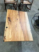 Square edge pecan slab with rich golden-brown tones, natural grain patterns, and organic edges.
