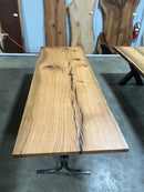 Square edge red oak wood slab with rich grain patterns, natural knots, and kiln-dried hardwood surface for custom furniture or table making.