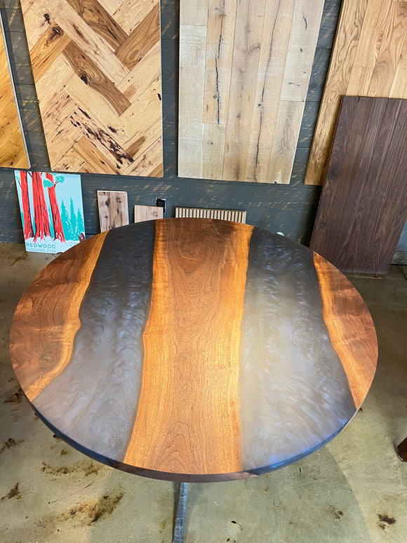 Handcrafted walnut river table with live edge walnut slab and resin river design