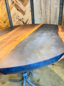Handcrafted walnut river table with live edge walnut slab and resin river design