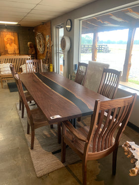 Modern walnut table with epoxy river detail and square edge finish