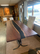 Modern walnut table with epoxy river detail and square edge finish