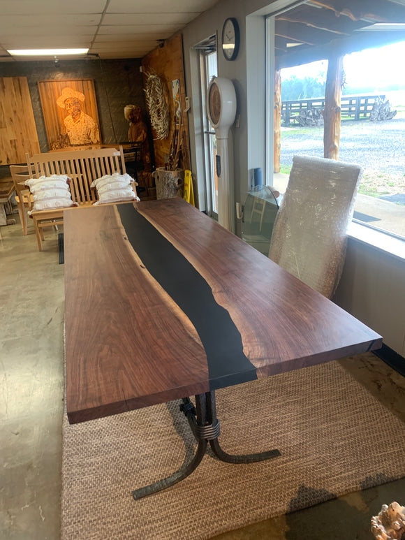 Modern walnut table with epoxy river detail and square edge finish
