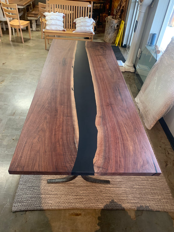 Modern walnut table with epoxy river detail and square edge finish