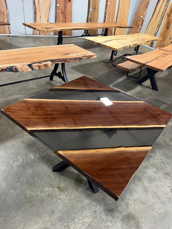 Modern walnut table with epoxy river detail and square edge finish