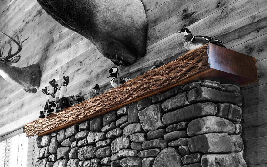 Walnut mantel rock fireplace cabin