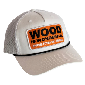 A white hat with a Wood is Wonderful Hochatown Oklahoma patch