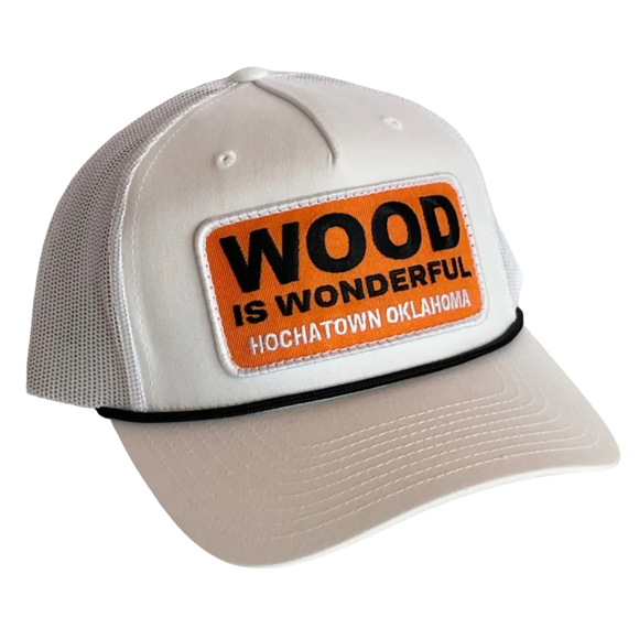A white hat with a Wood is Wonderful Hochatown Oklahoma patch