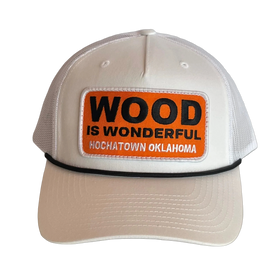 A white hat with a Wood is Wonderful Hochatown Oklahoma patch