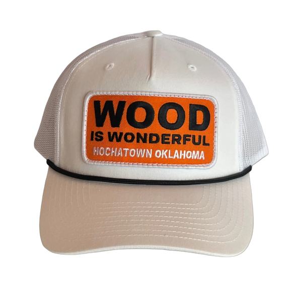 A white hat with a Wood is Wonderful Hochatown Oklahoma patch