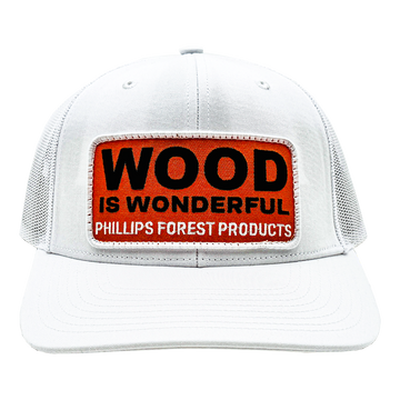 White hat with a Wood is Wonderful Phillips Forest Products patch