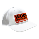 White hat with a Wood is Wonderful Phillips Forest Products patch