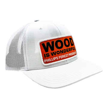 White hat with a Wood is Wonderful Phillips Forest Products patch