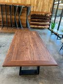 Walnut Plank Top Slab with rich brown grain and live-edge design, supported by black steel legs.