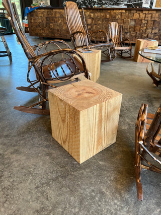 A wood beam cut off for a table. 