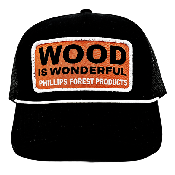 Black cap with an orange "Wood is Wonderful" Phillips Forest Products patch.