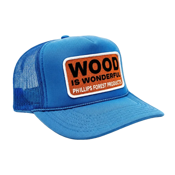 Blue trucker hat with 'Wood is Wonderful' Phillips Forest Products patch.