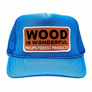 Blue trucker hat with 'Wood is Wonderful' Phillips Forest Products patch on a white background